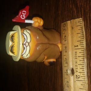 Garfield figurine holding a "GO" flag 1978, 1981.  Product of Hong Kong